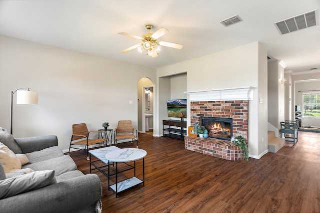 dining room with dark wood-type flooring, an inviting chandelier, and ornamental molding