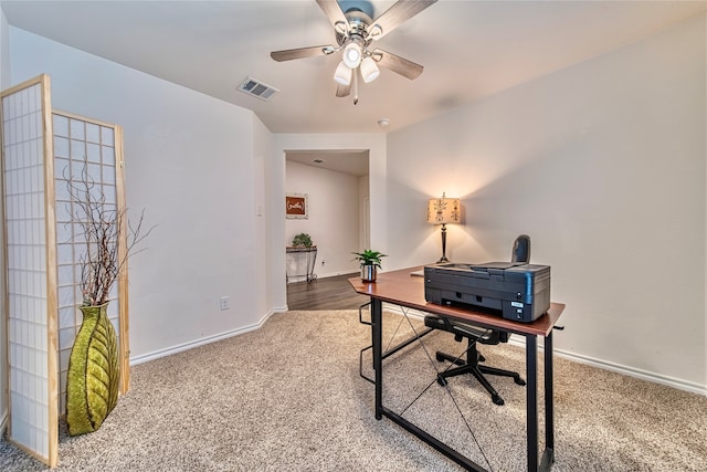 home office with ceiling fan and carpet floors