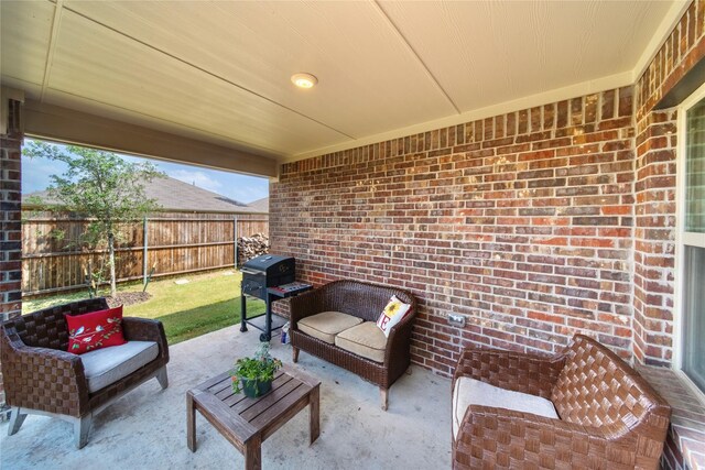 view of patio / terrace with an outdoor hangout area and area for grilling