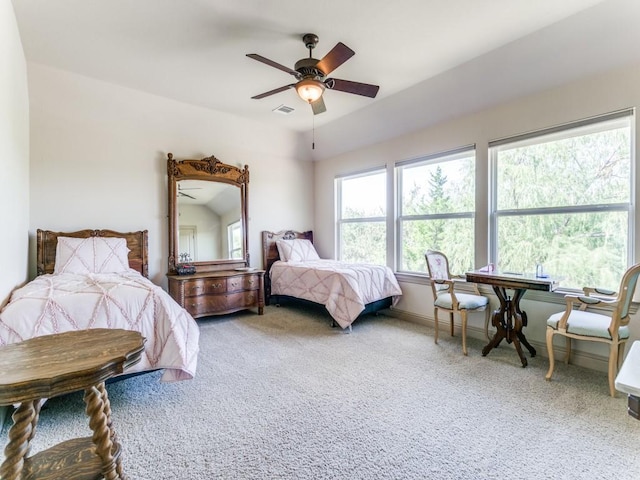 bedroom featuring ceiling fan and carpet floors