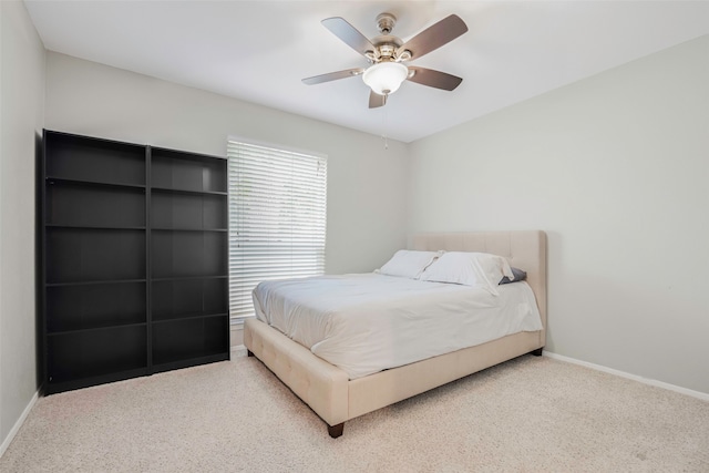 bedroom with ceiling fan and carpet flooring