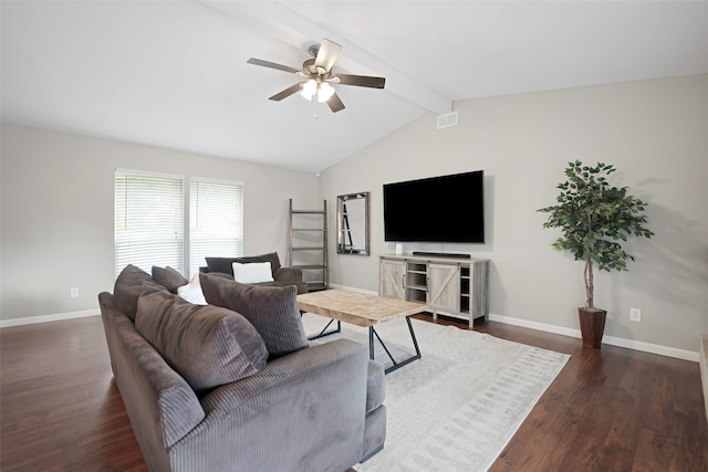 living room with lofted ceiling with beams, ceiling fan, and dark wood-type flooring