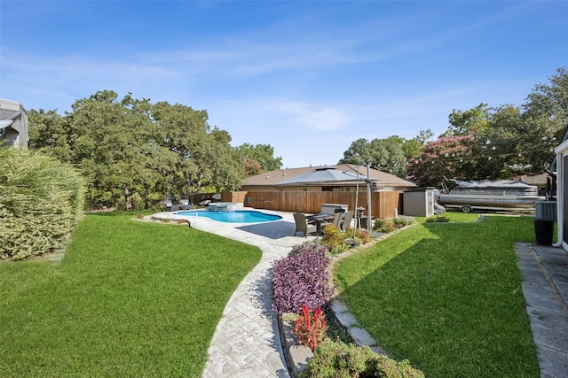 exterior space featuring a lawn and a patio area