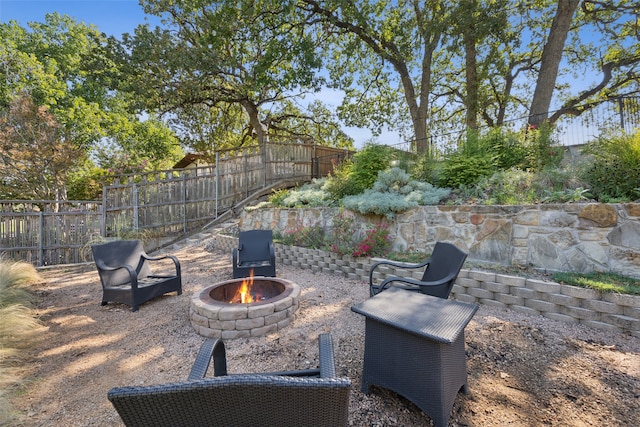 view of patio / terrace featuring a fire pit