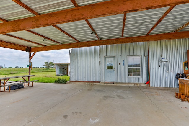 garage featuring a yard