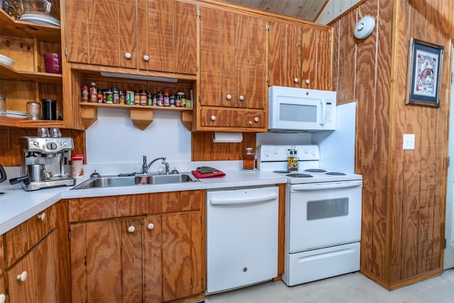 kitchen with sink and white appliances