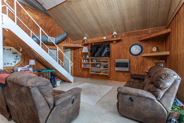 living room with wooden walls, vaulted ceiling, and wooden ceiling