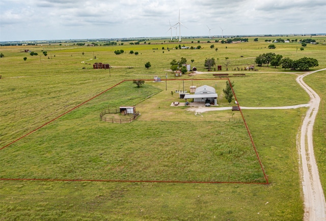 birds eye view of property with a rural view