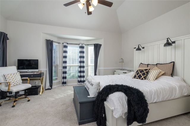 bedroom with light carpet, ceiling fan, and lofted ceiling