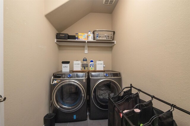 9736 Makiposa Ln, Fort Worth, TX 76177 - washroom featuring washer and clothes dryer and a textured wall
