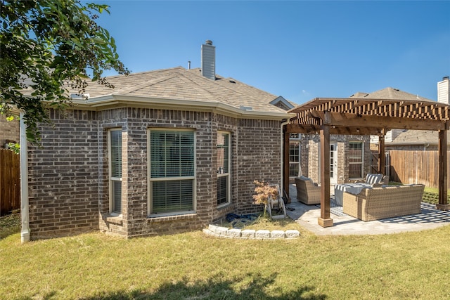 back of house with an outdoor hangout area, a yard, a pergola, and a patio