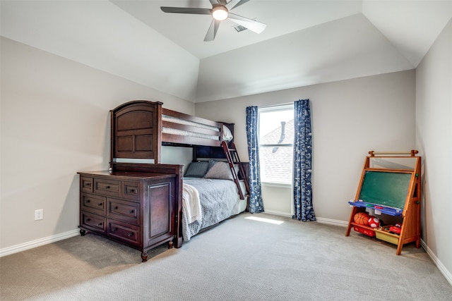 bedroom featuring carpet floors, vaulted ceiling, and ceiling fan