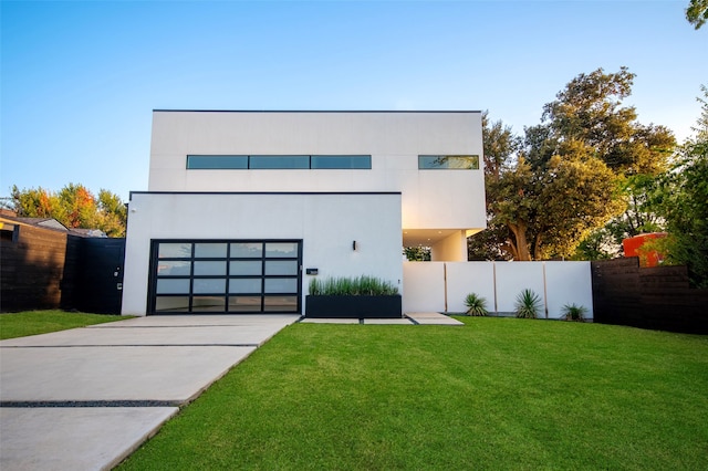 contemporary house with a front lawn