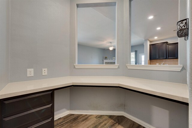 bathroom with sink, hardwood / wood-style floors, and toilet