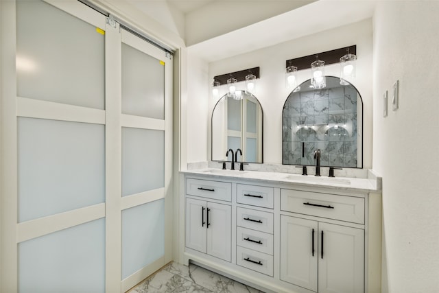 bathroom with walk in shower and vanity