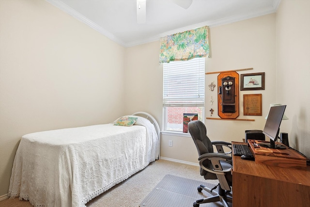 bedroom featuring ceiling fan, ornamental molding, and carpet flooring