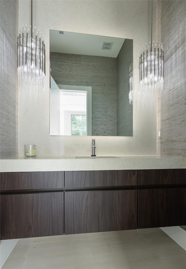 bathroom with vanity and tile patterned floors