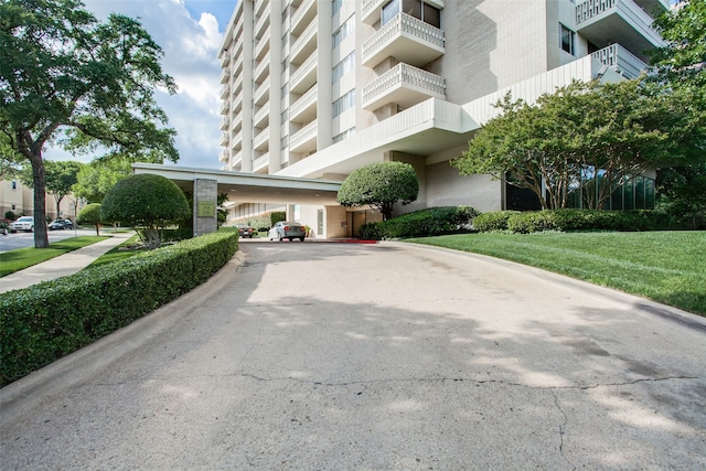 exterior space with a carport