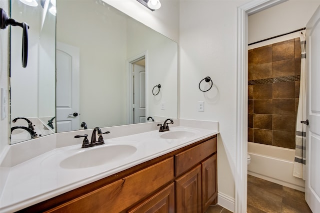 bathroom with shower / bathtub combination with curtain and vanity