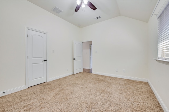 interior space with ceiling fan and lofted ceiling