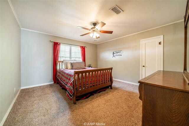 bedroom featuring ornamental molding, ceiling fan, and carpet floors