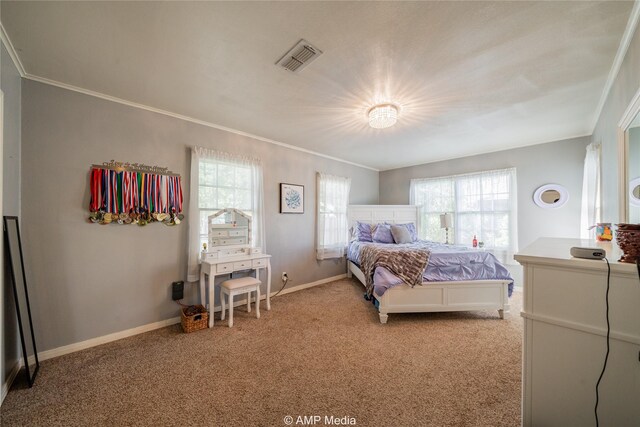 carpeted bedroom with crown molding