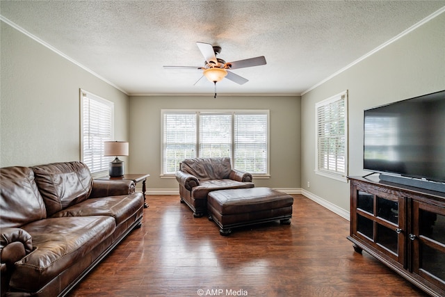 living room featuring a textured ceiling, ornamental molding, dark hardwood / wood-style flooring, and ceiling fan