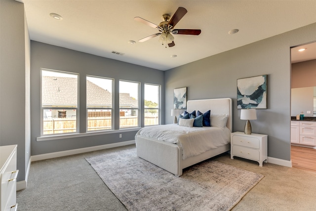 carpeted bedroom featuring ceiling fan