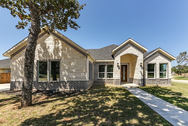 view of front of house with a front lawn