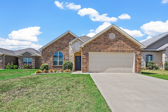 front of property featuring a garage and a front yard