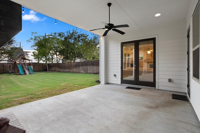 view of patio / terrace with a playground and ceiling fan