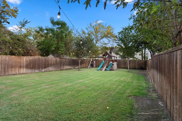 view of yard with a playground