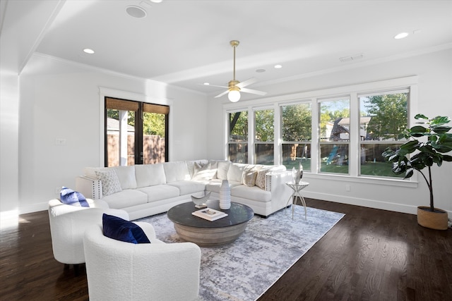 living room with ceiling fan, dark hardwood / wood-style floors, and crown molding