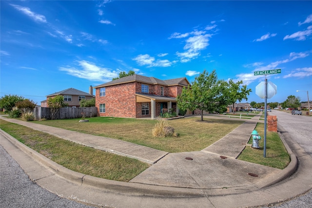 view of front of home with a front yard