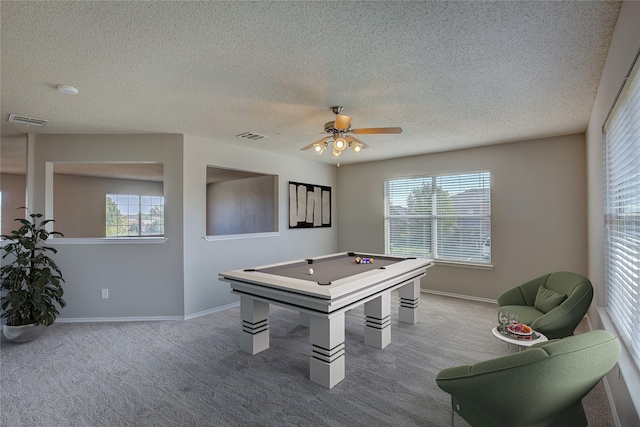 game room with carpet, pool table, ceiling fan, and plenty of natural light