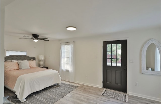 bedroom featuring ceiling fan and light hardwood / wood-style floors