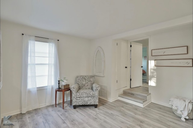 living area featuring light hardwood / wood-style flooring