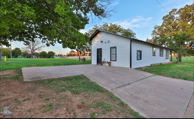 view of home's exterior featuring a lawn