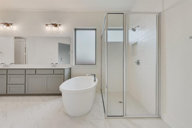 bathroom featuring vanity and plus walk in shower