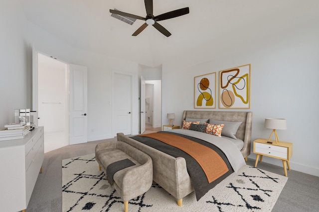 carpeted bedroom featuring ceiling fan