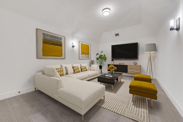 carpeted living room with lofted ceiling