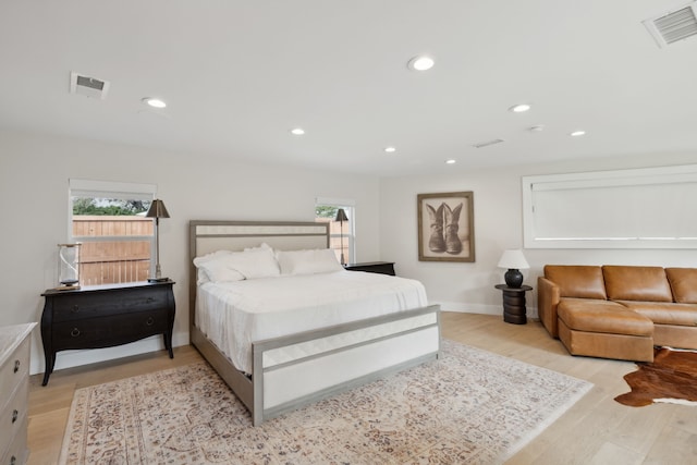 bedroom with light hardwood / wood-style floors