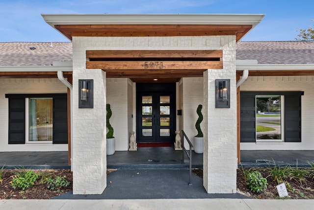 property entrance featuring french doors