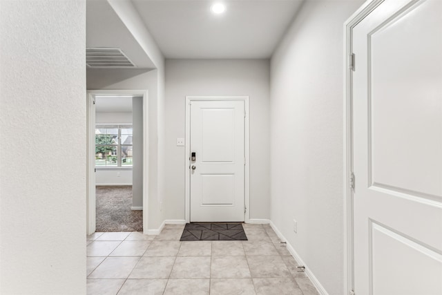 view of tiled foyer entrance