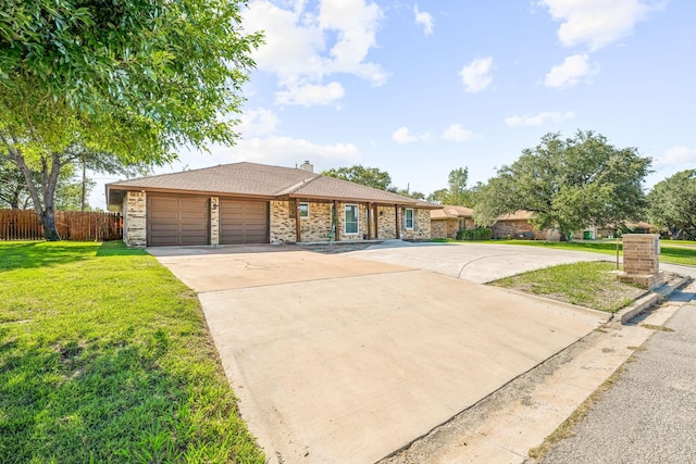 1424 Prairie Wind Blvd, Stephenville, TX 76401 - view of front of home featuring an attached garage, driveway, and a chimney