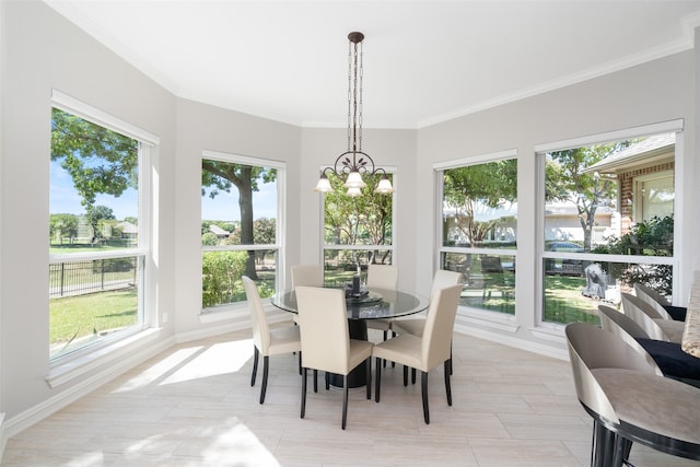 dining room featuring an inviting chandelier and a wealth of natural light