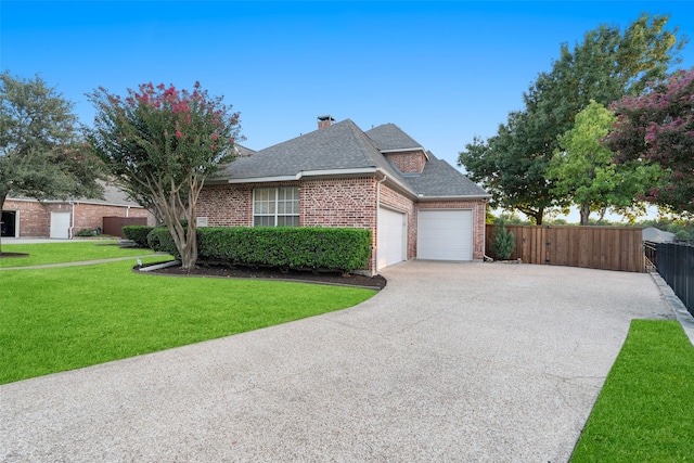 view of front facade featuring a garage and a front lawn