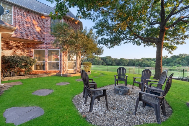 view of yard with a patio and a fire pit