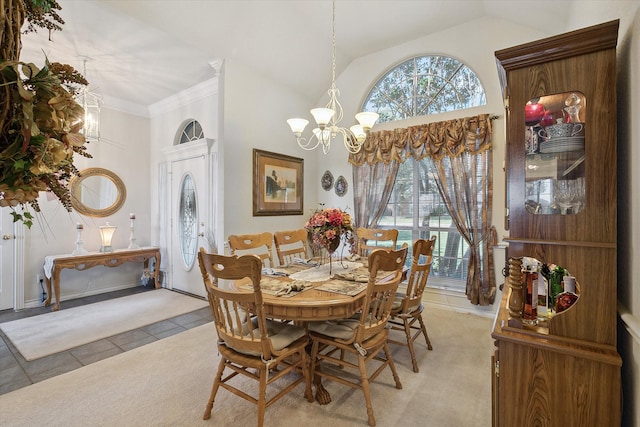 carpeted dining area with ornamental molding, lofted ceiling, and an inviting chandelier