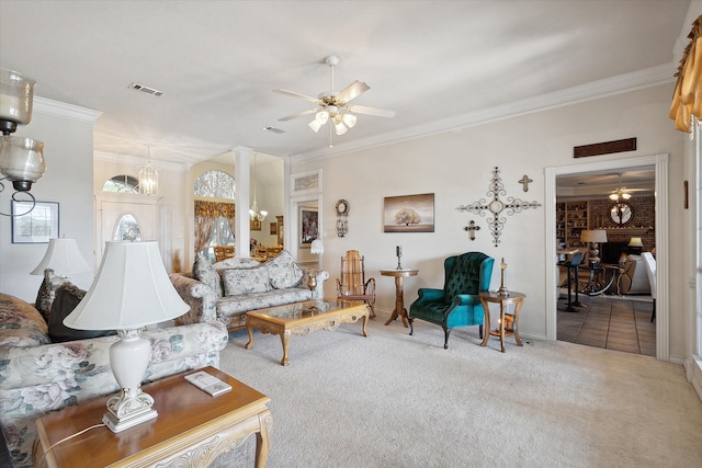 carpeted living room featuring ceiling fan and ornamental molding